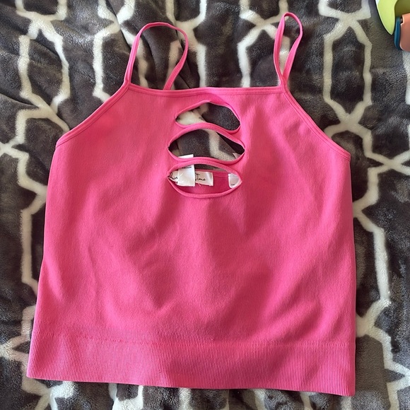 Pink tank with rips at boob area. Size L. - Picture 1 of 1